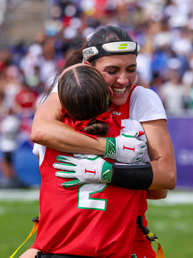 Mexico flag football players celebrate wearing Invictus gloves at the 2026 IFAF world championships in Dusseldorf