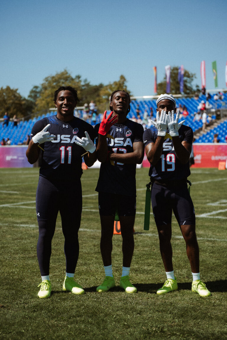 Team USA flag football players Isaiah Calhoun, Velton Brown Jr. and Shawn Theard Jr. wearing Invictus gloves at the 2026 world championships